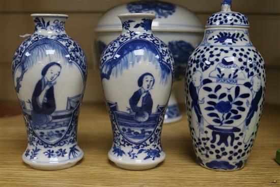 A Chinese blue and white bowl, liner and cover and three vases